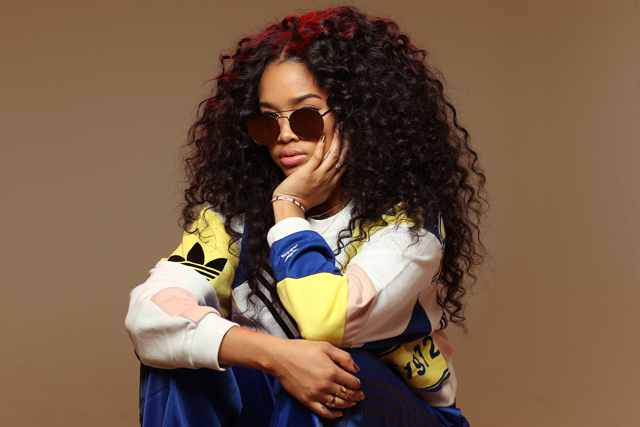 Watch H.E.R. 'Hold Us Together' Music Video