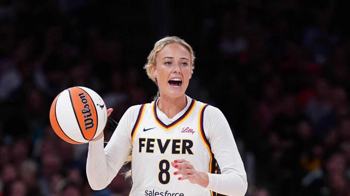 Sophie Cunningham handles the ball for the Indiana Fever during a WNBA game.