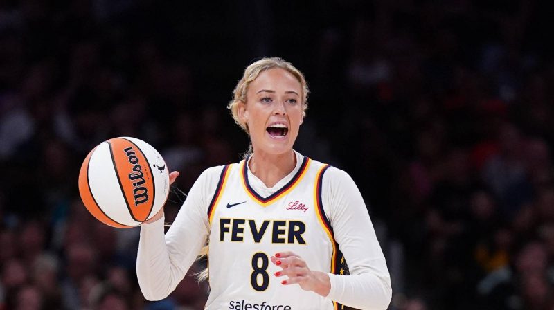 Sophie Cunningham handles the ball for the Indiana Fever during a WNBA game.