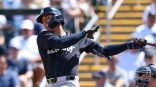 George Lombard Jr. of the New York Yankees hits during spring training against the Minnesota Twins