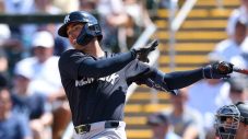 George Lombard Jr. of the New York Yankees hits during spring training against the Minnesota Twins