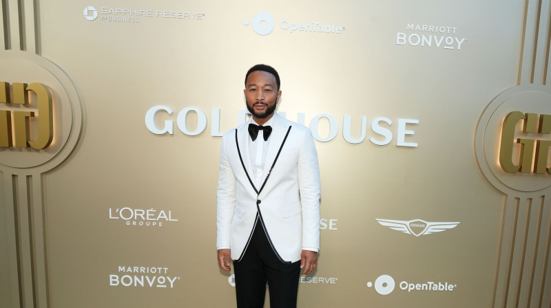 John Legend in a white dinner jacket at the 2026 Gold Gala in Los Angeles