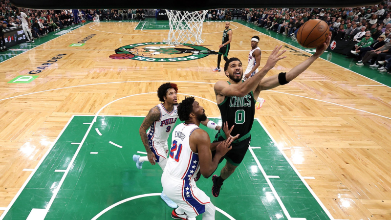 Jayson Tatum - BOSTON, MASSACHUSETTS - APRIL 28: Jayson Tatum #0 of the Boston Celtics takes a shot against Joel Embiid #21 of the Philadelphia 76ers during Game Five of the First Round of the NBA Eastern Conference Playoff at TD Garden on April 28, 2026 in Boston, Massachusetts. NOTE TO USER: User expressly acknowledges and agrees that, by downloading and or using this photograph, User is consenting to the terms and conditions of the Getty Images License Agreement. (Photo by Maddie Meyer/Getty Images)