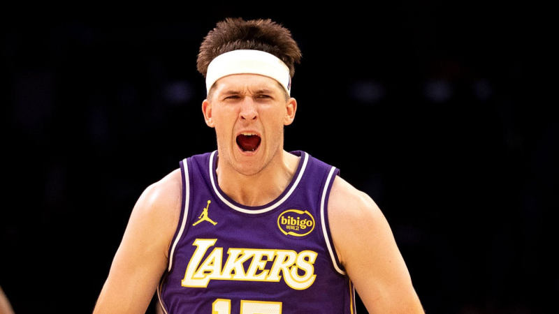Austin Reaves - LOS ANGELES, CA - FEBRUARY 5, 2026: Los Angeles Lakers guard Austin Reaves (15) reacts after sinking a three point shot in the Lakers 119-115 win over the Philadelphia 76ers at Crypto.com Arena on February 5, 2026 in Los Angeles, California. Reeves 35 points are the most off the bench this season.(Gina Ferazzi / Los Angeles Times via Getty Images)