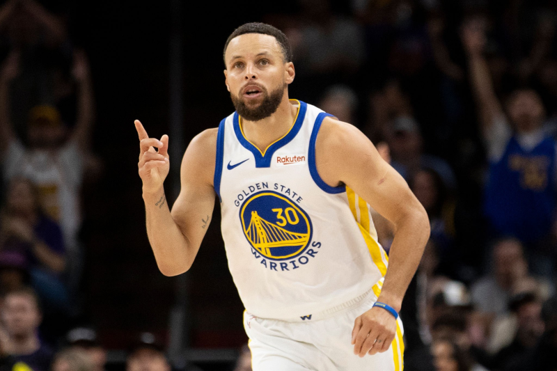 Stephen Curry - Golden State Warriors guard Stephen Curry (30) gestures after scoring a three-point shot during the first half of his NBA play-in tournament game against the Phoenix Suns at Mortgage Matchup Center in Phoenix, Ariz., Friday, April 17, 2026. (Photo by Stephen Lam/San Francisco Chronicle via Getty Images)