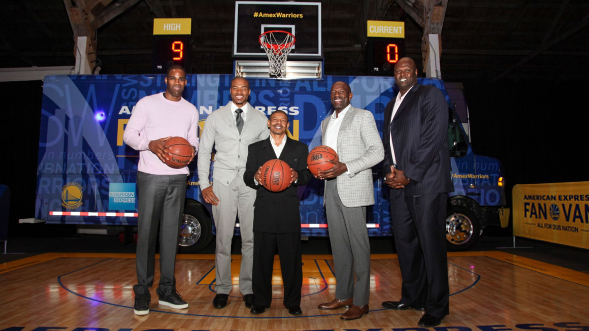 Muggsy Bogues - SAN FRANCISCO, CA - APRIL 08: (L-R) Golden State Warriors Legends Antawn Jamison, Corey Maggette, Muggsy Bogues, Tony Delk, and Adonal Foyle pose for a photo in front of the American Express Fan Van at the final American Express "All for Dub Nation" Watch Party on April 8, 2017 in San Francisco, California. (Photo by Kelly Sullivan/Getty Images for American Express)