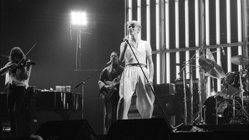 David Bowie - British musician David Bowie and his band perform at the Spectrum, Philadelphia, Pennsylvania, April 28, 1978. (Photo by Allan Tannenbaum/Getty Images)